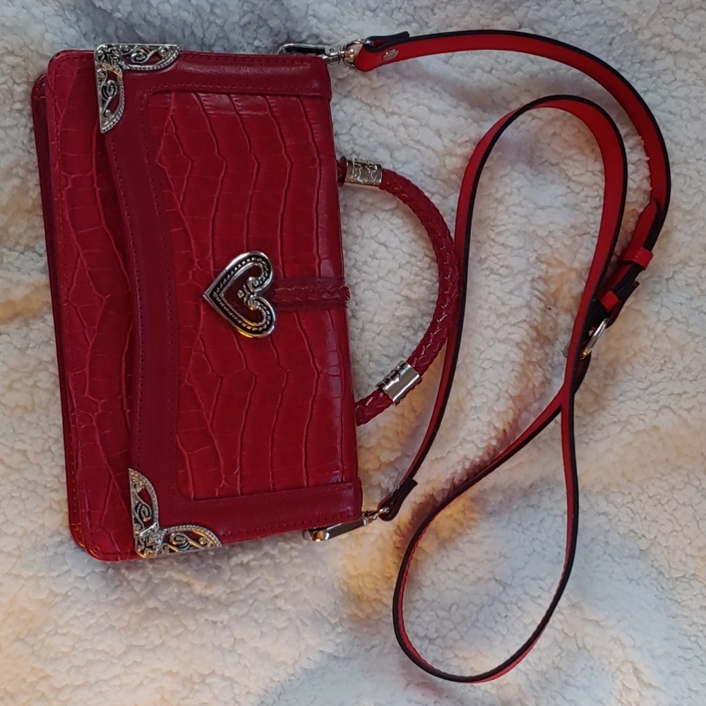 Beautiful clutch red handbag with heart